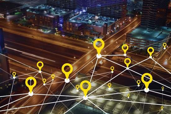 Network connections over a city at night